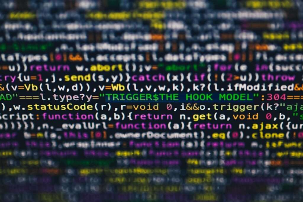 Suchmaschinenoptimierung Hannover - Nahaufnahme eines Computerbildschirms, auf dem mehrere Zeilen bunten Codes angezeigt werden. Der Text enthält Programmiersyntax mit verschiedenen Variablen, Funktionen und Fehlermeldungen. SEO Hannover-Experten konnten dies leicht analysieren, da der Hintergrund schwarz ist und den hellen Text in den Farbtönen Gelb, Lila, Grün und Weiß hervorhebt. Local SEO Agentur Hannover.