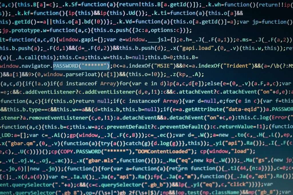 Computer screen displaying program code, website development, application building, password