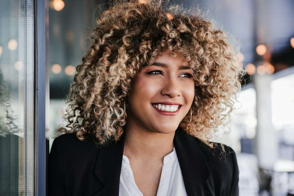 portrait of happy confident business woman in cafe. Business concept