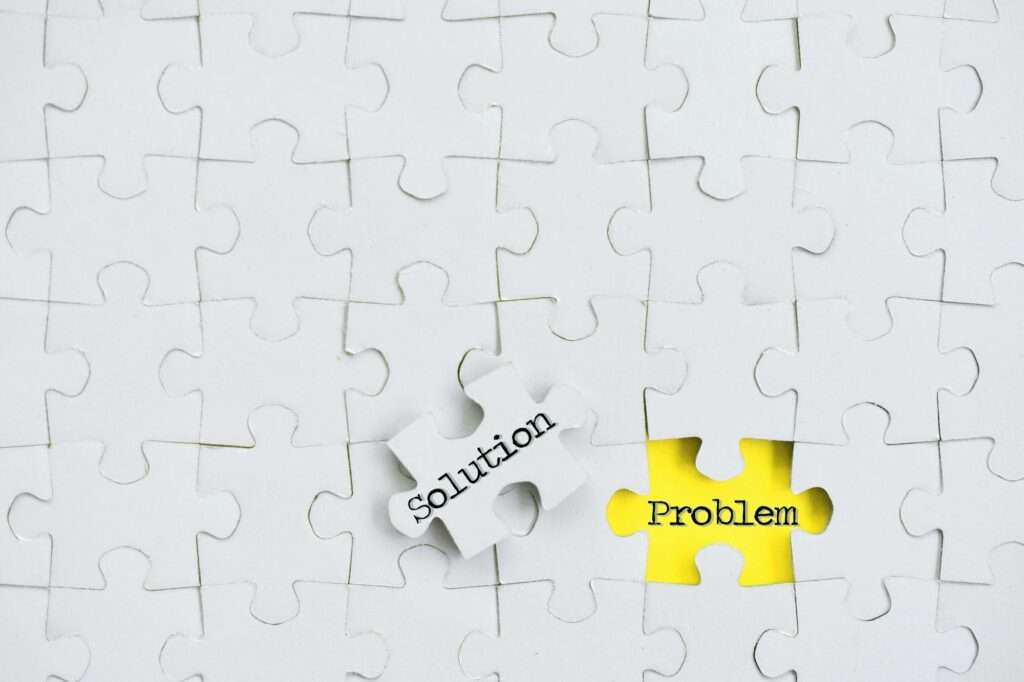 Puzzle pieces finding a solution concept - finding the answer to problems, yellow