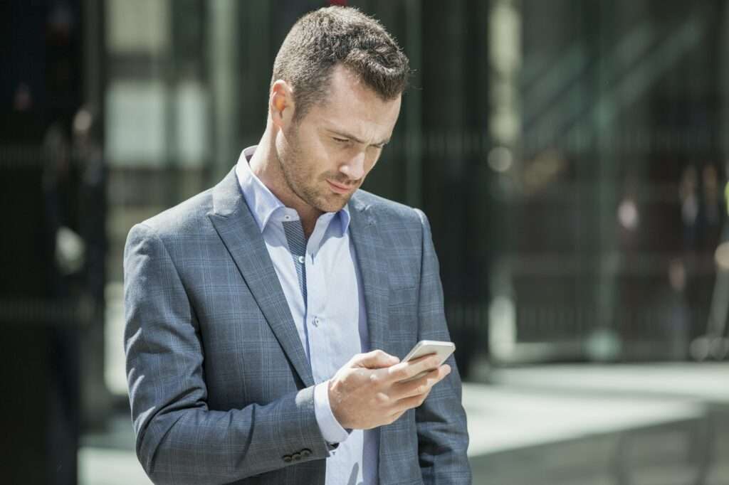 Businessman using mobile phone