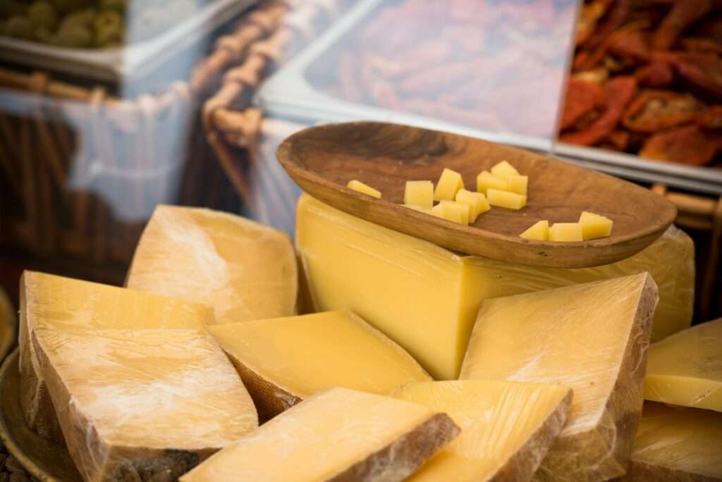 Chunks of different cheeses at a local european market