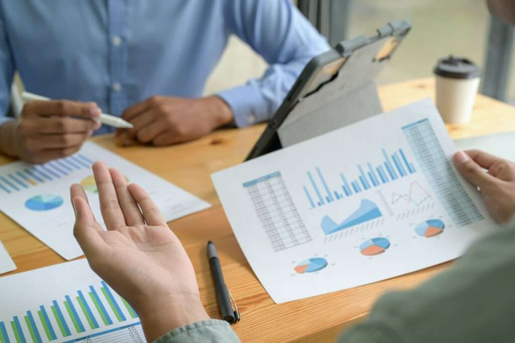 Cropped shot of The office staff is speeding up the annual business performance summary.